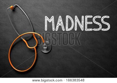 Medical Concept: Madness - Text on Black Chalkboard with Orange Stethoscope. Black Chalkboard with Madness - Medical Concept. 3D Rendering.