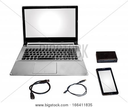 Laptop pc smart phone card reader and data cables chord isolated in white.