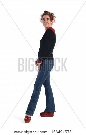 Woman with blue jeans and a white background