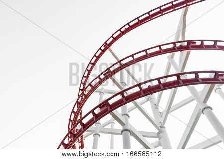 Roller coaster (red) in the amusement park isolated (copy space)