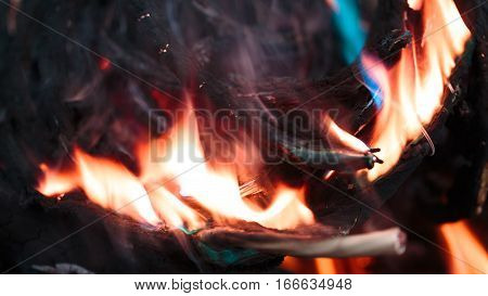 wires on fire. Firing winding insulation of electrical wiring in the fire close-up