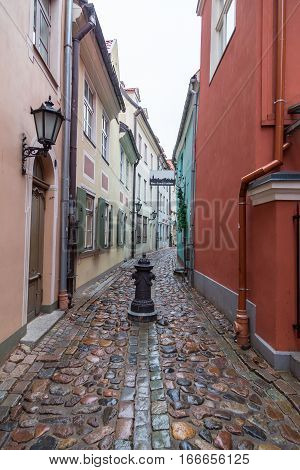 RIGA LATVIA - 2ND JAN 2017: A view along Torna Iela in Riga during the day showing the outside of shops and restaurants.