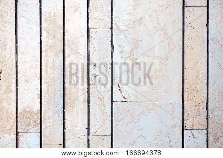 Old lined stone tile wall texture background