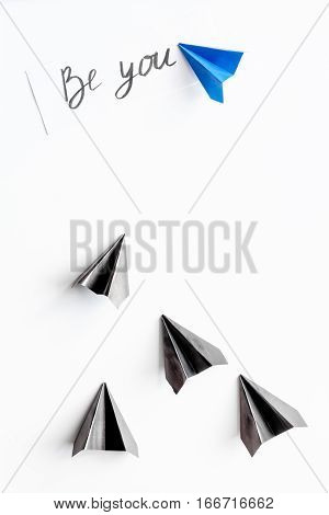 choice concept paper boats on white background top view.