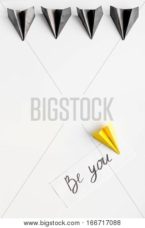 choice concept paper boats on white background top view.