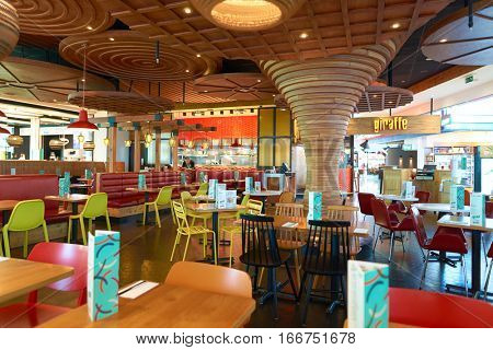DUBAI, UAE - CIRCA NOVEMBER, 2016: inside Dubai Airport. There are a lot of restaurants, bars, cafes and shops in Dubai International Airport. Almost all of them are open twenty-four hours.