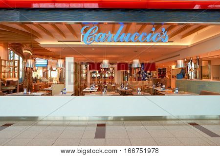 DUBAI, UAE - CIRCA NOVEMBER, 2016: inside Dubai Airport. There are a lot of restaurants, bars, cafes and shops in Dubai International Airport. Almost all of them are open twenty-four hours.