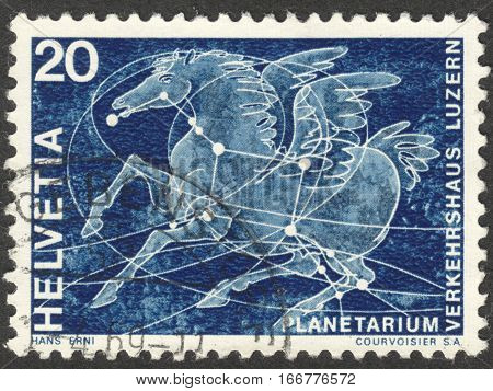 MOSCOW RUSSIA - CIRCA DECEMBER 2016: a post stamp printed in SWITZERLAND shows constellation of Pegasus dedicated to opening of the 1st Swiss planetarium Lucerne circa 1969