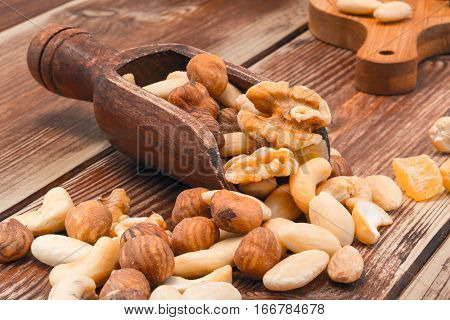 Salted nuts on wooden table , kitchen, natural