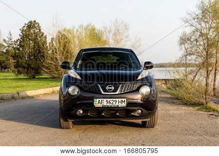 DNIPRO UKRAINE - APRIL 12 2016: NISSAN JUKE NEAR THE RIVER