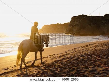 Seaside horse riding, beach horse riding, horse ride at sunset