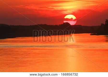 Sunset on the river romatic view with sun