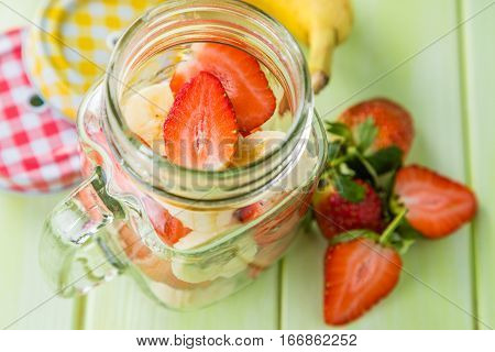 Banana and strawberry smoothie, inredients, copy space