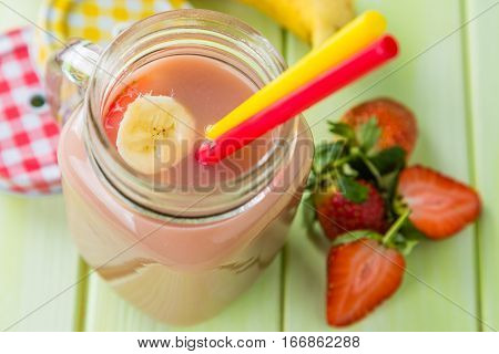 Banana and strawberry smoothie, inredients, copy space