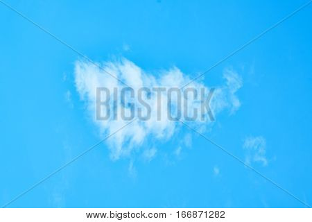 Beautiful Blue Sky with Fluffy Clouds Background