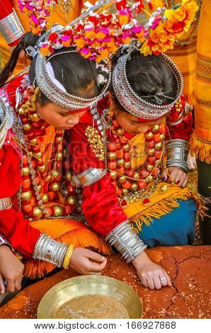Kneeling Girls In Meghalaya