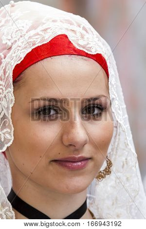 CAGLIARI, ITALY - May 1, 2014: 358 Religious Procession of Sant'Efisio - Sardinia - portrait of a beautiful woman in traditional Sardinian costume