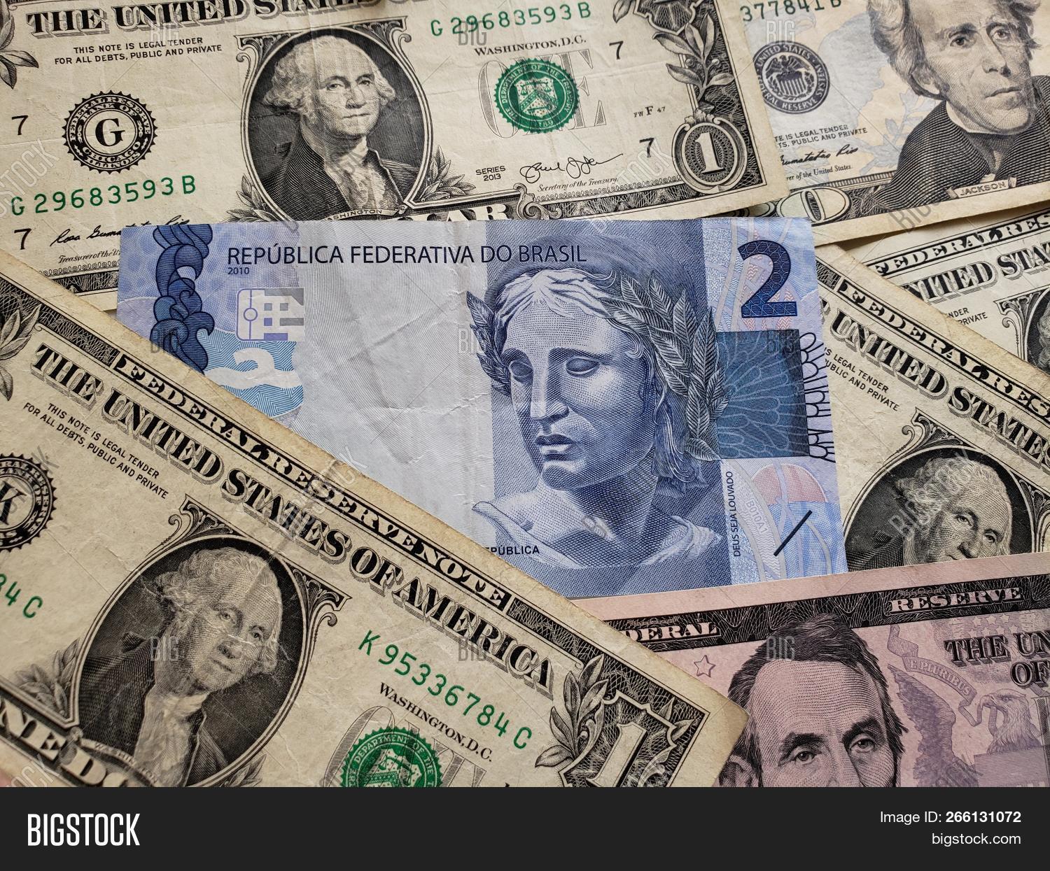 Brazilian Banknote Two Image Photo Free Trial Stock Brazilian Banknote Of Two Reais And American Dollars Bills Background Texture