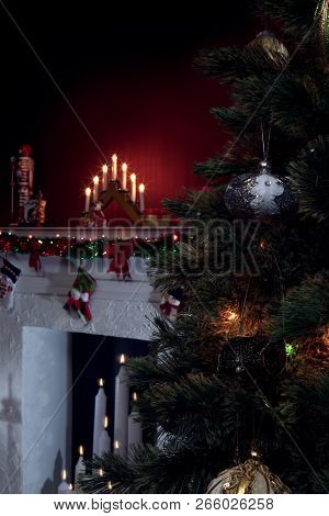 View Of Nice White Christmas Decorated Fireplace  And Christmas Tree