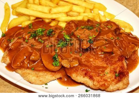 German Jaeger Schnitzel ( Hunter Schnitzel )  With French Fries