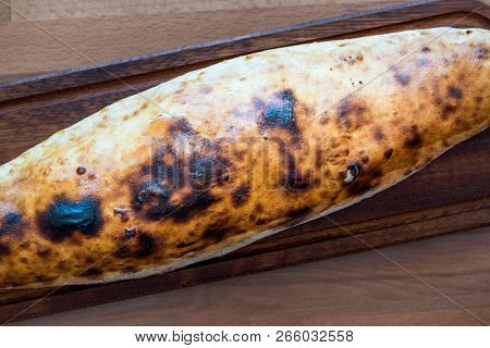 Turkish Bafra Pide With Minced Meat Kavurma Salad And Pickles. Traditional Food.