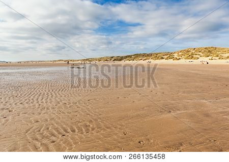 Camber Sands, Sandy Beach At The Village Of Camber, East Sussex Near Rye, England. Coastline In A Lo