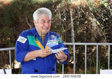 Bauru, Brazil - June 13, 2015 - Marcos Pontes Astronaut  Holding A Plastic Model During Aerial Event