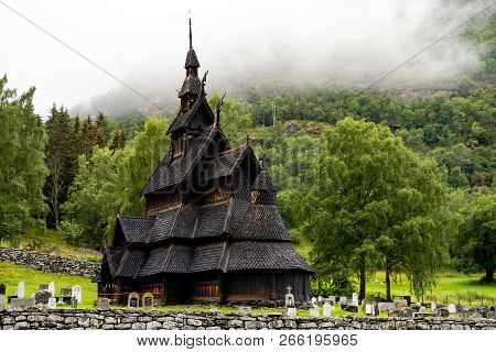 Borgund Stave Church (stavkyrkje) In Norway In Misty Cloudy Weather