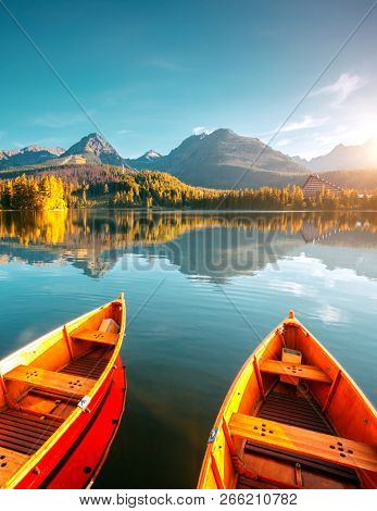 Calm mountain lake in National Park High Tatra. Location place Strbske pleso, Slovakia, Europe. Scenic image of most popular european travel destination. Summer vacation. Discover the beauty of earth.