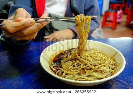 Jajangmyeon, Jjajangmyeon (noodles In Black Bean Sauce) Is A Korean Chinese Noodle Topped With A Thi