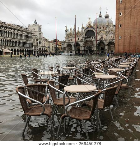 Venice, Italy - 1 November 2018: San Marco square under water, city has been flooded by waters rising 156 cm
