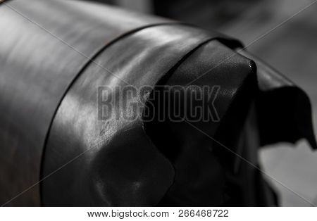 Different Pieces Of Leather In A Rolls. The Pieces Of The Colored Leathers. Rolls Of Natural Brown A