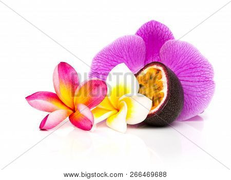 Passion Fruit Isolated On White Decorated With Frangipani Flowers And Orchid Flower