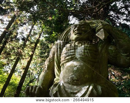 Kunisaki, Japan - October 30, 2016: Stone Guardian Statue At Futagoji Buddhist Temple On Kunisaki Pe