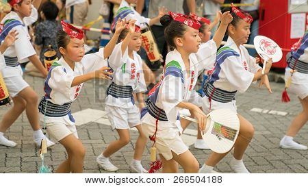 Tokyo, Japan - August 2018: Japanese Children Dancing Traditional Awaodori Dance In The Famous Koenj