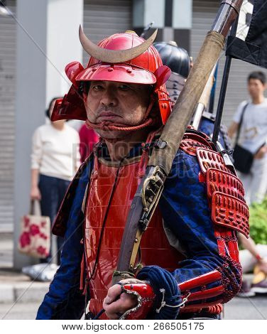 Gifu, Japan - October 4, 2015: Man Dressed As Samurai In Armor With Hackbut During The 59th Annual N