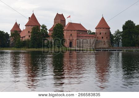 Tracai Castle On The Island In The Lake. Reflection In Water.