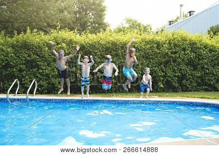 Goup Of Childrens In Outside Swimming Pool