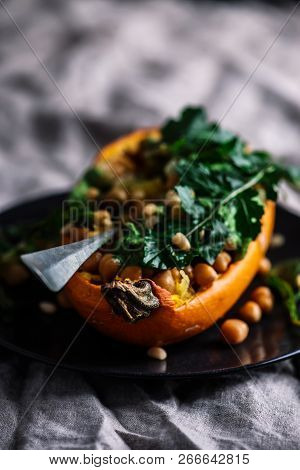 Stuffed Spaghetti Squash With Chickpeas And Garlicky Arugula Cream.selective Focus