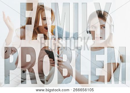 Difficult Teeneger. Conflict Between Mother And Daughter. Mother Screaming On Daughter With Megaphon