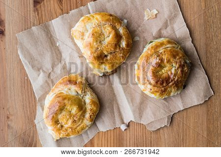 Izmir Boyoz / Round Borek (homemade Food) On Wooden Surface