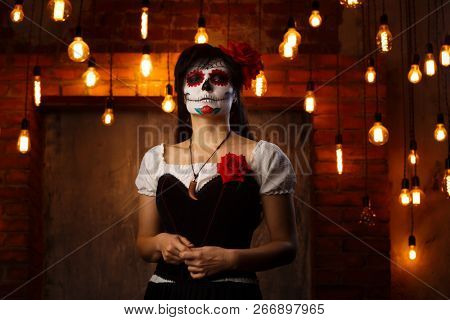 Halloween picture of woman with white make-up on her face
