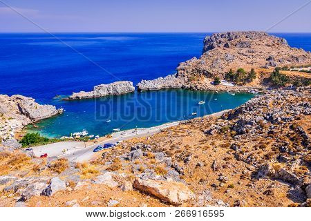 Rhodes, Greece. Lindos Small Whitewashed Village And The Acropolis, Scenery Of Rhodos Island At Aege
