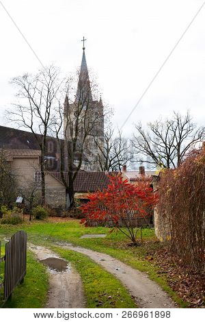 Old Church And City Streets At Autumn. Leafs, Nature And Architecture. Historic Buildings. Travel Ph
