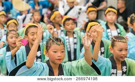 Tokyo, Japan - August 2018: Japanese Children Dancing Traditional Awaodori Dance In The Famous Koenj