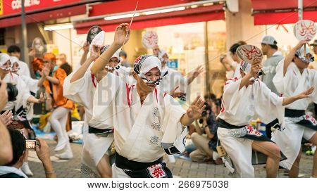 Tokyo, Japan - August 2018: Japanese Performers Dancing Traditional Awaodori Dance In The Famous Koe
