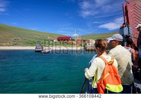 OLKHON ISLAND, 27 AUGUST, 2019: Passengers waiting the Ferry boat to Olkhon Island, Baikal Lake, Siberia, Russia