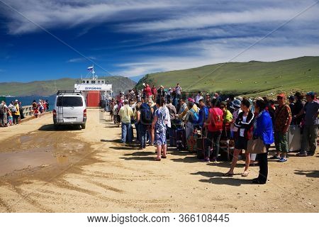 OLKHON ISLAND, 27 AUGUST, 2019: Passengers waiting the Ferry boat to Olkhon Island, Baikal Lake, Siberia, Russia