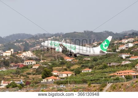 Madeira, Portugal - August 3, 2018: Plane Takes Off From Madeira Airport Runway.