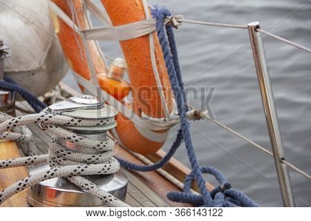 Sailboat Winch And Rope Yacht Detail. Nautical Part Of A Yacht With Cords, Rigging, Sail, Mast, Anch